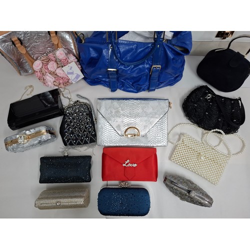 45 - A group of fashion and beaded evening bags to include a L.A.M.B silver and tan leather handbag and a... 