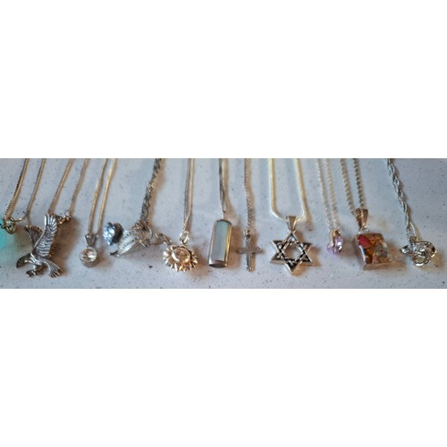 53 - A quantity of silver chains (min 41.5g). a Plenderleiths silver 2-tone necklace and matching bracele... 