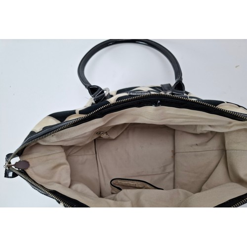 36 - Lulu Guinness- A fabric 50's scallop print pleated tote bag in black, white and beige having black p... 