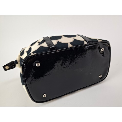 36 - Lulu Guinness- A fabric 50's scallop print pleated tote bag in black, white and beige having black p... 