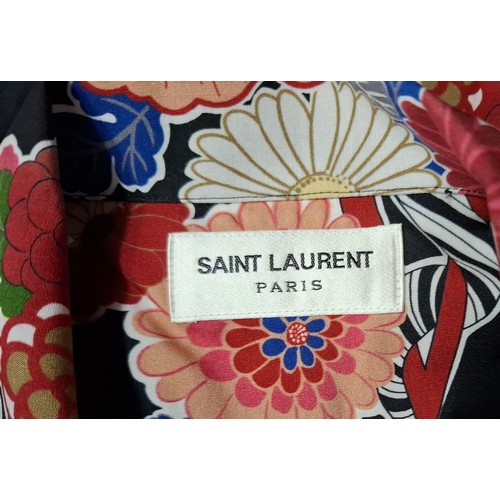 8 - Saint Laurent- An unworn gents black casual shirt with multi-coloured Japanese inspired design, size... 