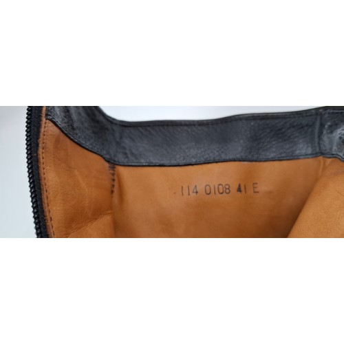9 - Gucci- A pair of unworn gents black hide ankle boots 'Nero 19' having a side zipper with leather tog... 