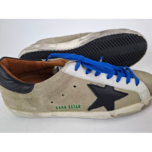 24 - Golden Goose- A pair of unworn gents Superstar skateboard sneakers, made in Italy, European size 41 ... 