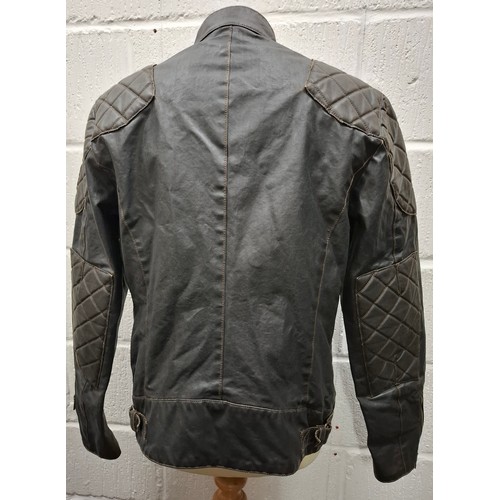 26 - Belstaff- A gents dark brown wax cotton biker style jacket having a tartan lining and black cord col... 