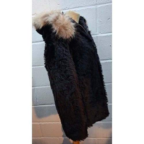 6 - Saint Laurent- An unworn Autumn 2016 black faux fur coat with black padded lining, black leather det... 