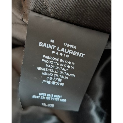 6 - Saint Laurent- An unworn Autumn 2016 black faux fur coat with black padded lining, black leather det... 