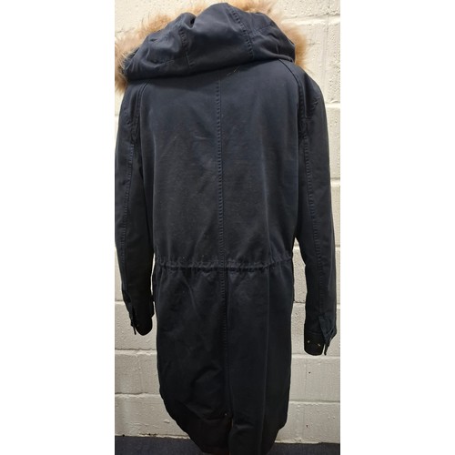 27 - Yves Salomon- A gents navy hooded parka coat having a detachable brown rabbit fur lining and coyote ... 