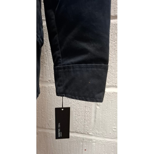 29 - Yves Salomon- An unworn black cotton parka coat having a detachable black rabbit fur lining and coyo... 