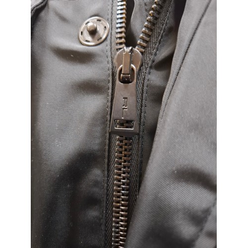 37 - Ralph Lauren- A black Waterproof Black Label Cargo Escape jacket having a double opening with detach... 