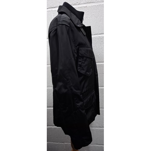 37 - Ralph Lauren- A black Waterproof Black Label Cargo Escape jacket having a double opening with detach... 