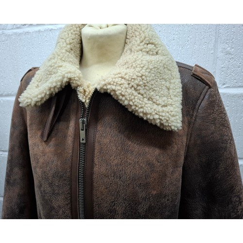30 - Golden Goose- A gents brown leather flying style jacket with fleece lining and front zip closure, Eu... 