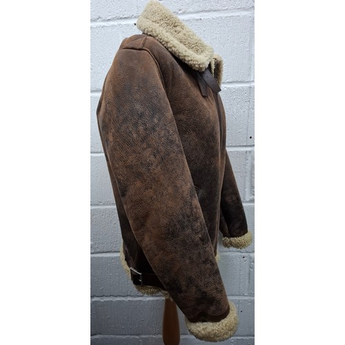 30 - Golden Goose- A gents brown leather flying style jacket with fleece lining and front zip closure, Eu... 
