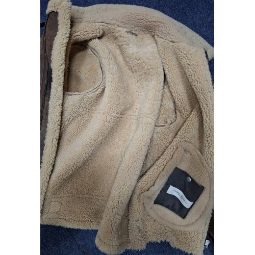 30 - Golden Goose- A gents brown leather flying style jacket with fleece lining and front zip closure, Eu... 