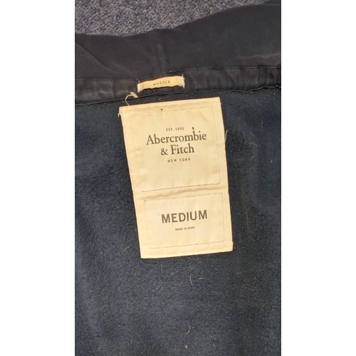 46 - Abercrombie & Fitch- A late 1990's gents navy Sherpa button front and lined hoody having white moose... 