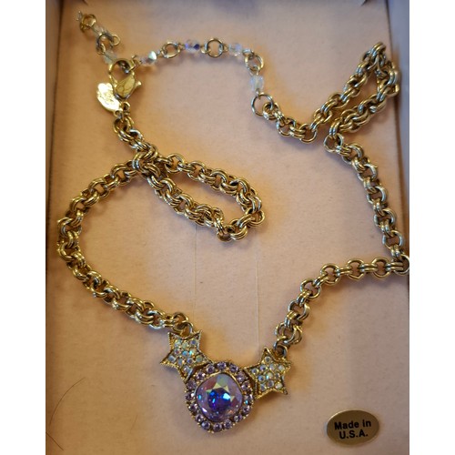 50 - Kirks Folly- A collection of gold tone and crystal fairy pendants, mixed necklaces and a brooch all ... 