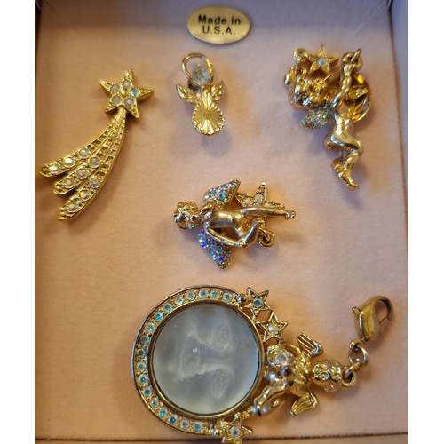50 - Kirks Folly- A collection of gold tone and crystal fairy pendants, mixed necklaces and a brooch all ... 
