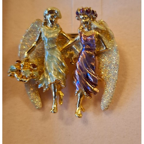 50 - Kirks Folly- A collection of gold tone and crystal fairy pendants, mixed necklaces and a brooch all ... 