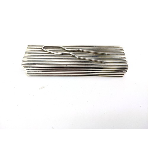 An unusual Victorian silver hair pin, box of rectangular reeded form ...
