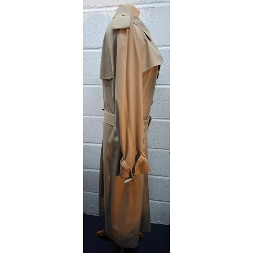 16 - Burberrys- A gents beige trench coat with matching belt,  leather buckles to belt and cuffs, 2 deep ... 