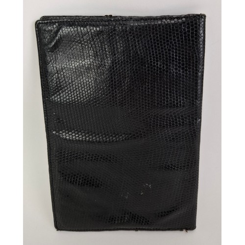 17 - Asprey- A pre-1970's black leather snakeskin wallet with the initials NSG within a circle in yellow ... 