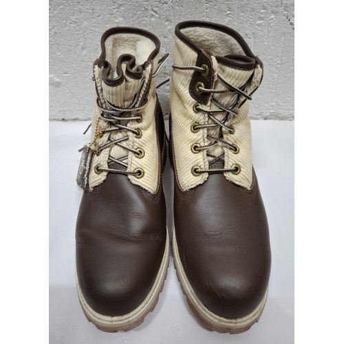 38 - Timberland-A pair of men's unworn brown and beige roll top ankle boots, size 7.5 together with origi... 