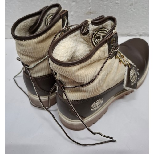 38 - Timberland-A pair of men's unworn brown and beige roll top ankle boots, size 7.5 together with origi... 