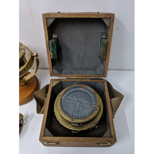 2 - Three compasses to include a pocket example, a cased example and another on a swing swivel base
Loca... 