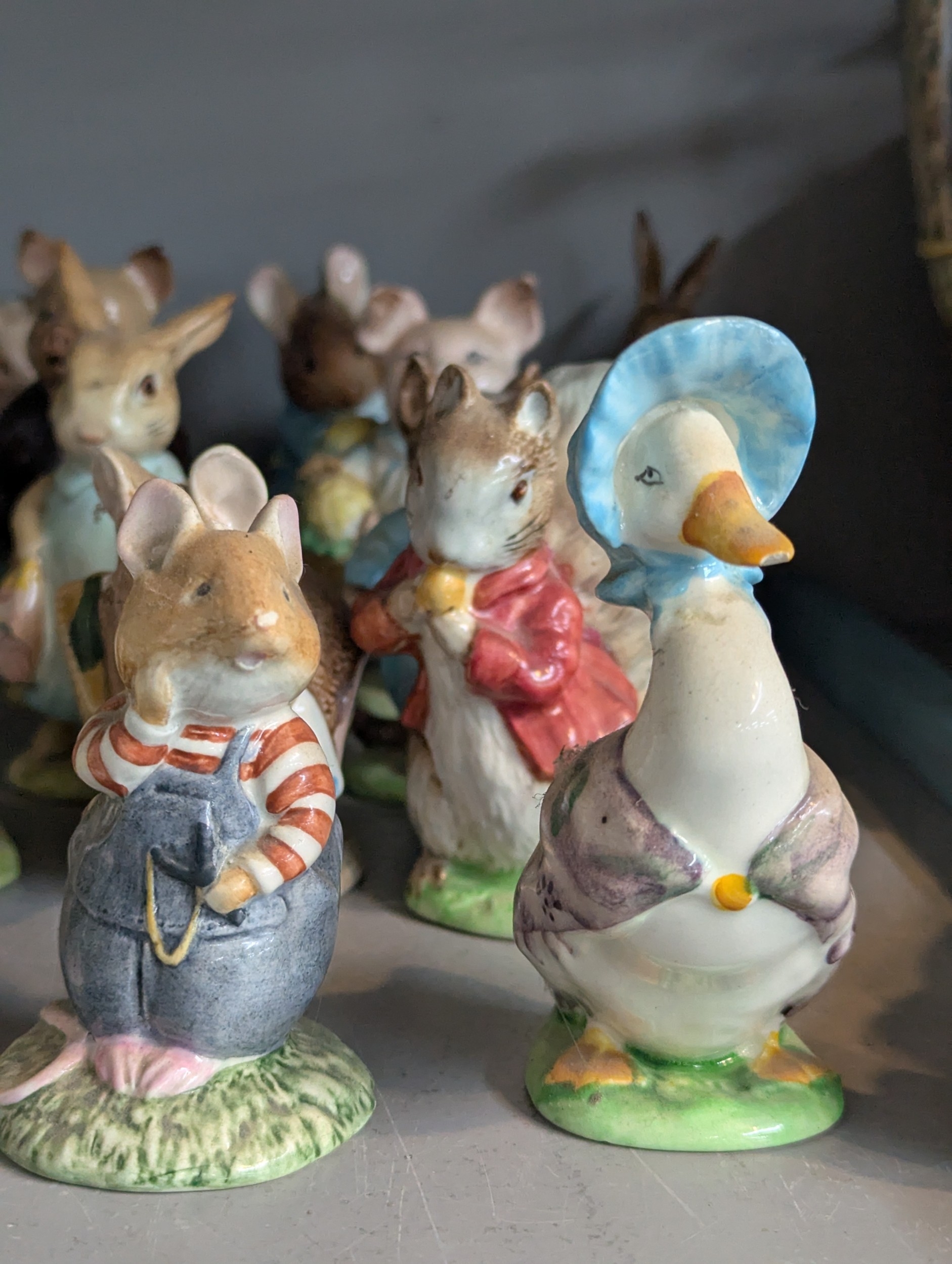 A collection of Beswick Beatrix Potter figurines, some examples with ...