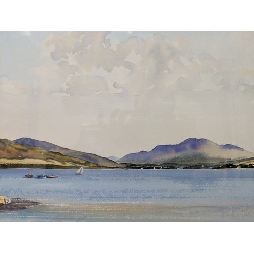 29 - MWM Prentice, a watercolour depicting a large loch with small fishing boats and sailing boats on the... 