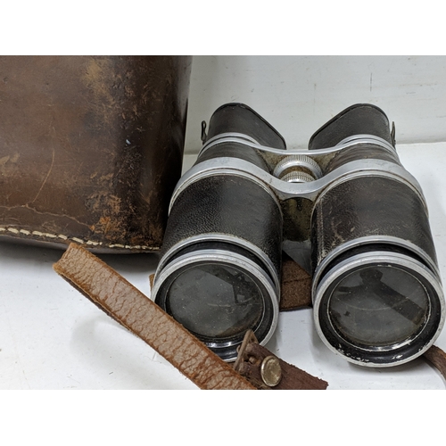 3 - A pair of Aitchison & Co binoculars and a microscope, both from an early/mid 20th century
Location:1... 