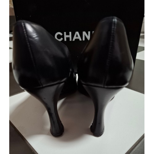 5 - Chanel- A pair of black leather court shoes, made in France, European size 38.5, 3