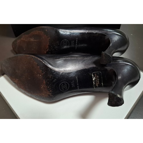 5 - Chanel- A pair of black leather court shoes, made in France, European size 38.5, 3