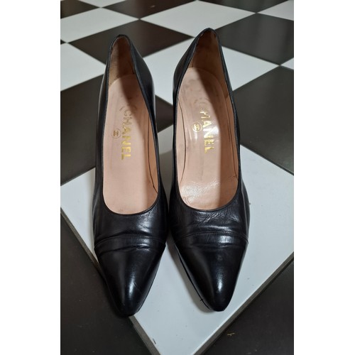 5 - Chanel- A pair of black leather court shoes, made in France, European size 38.5, 3