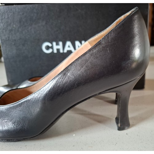 5 - Chanel- A pair of black leather court shoes, made in France, European size 38.5, 3