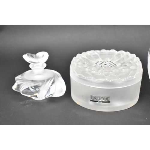 140 - A collection of Lalique glass to include a 'Dahlia' pattern large scent bottle 18cm high x 14cm wide... 