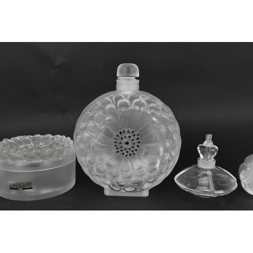 140 - A collection of Lalique glass to include a 'Dahlia' pattern large scent bottle 18cm high x 14cm wide... 