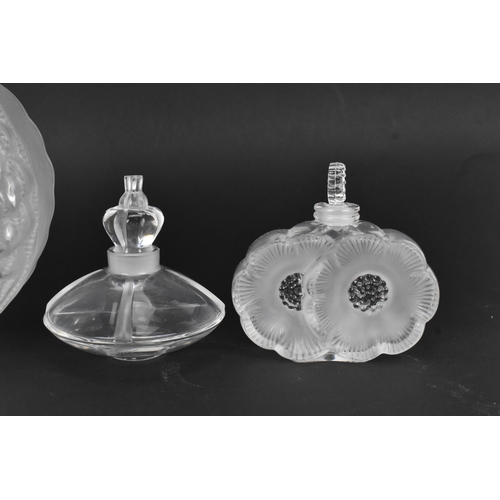140 - A collection of Lalique glass to include a 'Dahlia' pattern large scent bottle 18cm high x 14cm wide... 