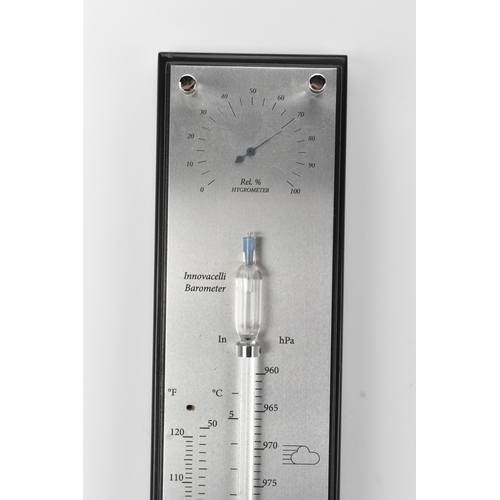 143 - A Dingens 'The Innovacelli' wall barometer, with two scaled tubes and sliding indicator, with origin... 