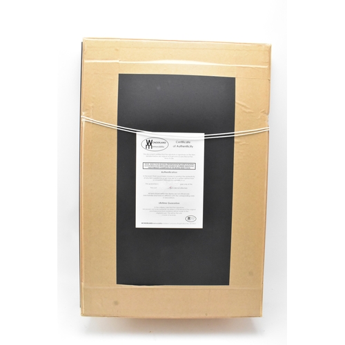 174 - Boxing Memorabilia: A boxing glove signed by Mike Tyson, set within a frame, bears certificate of Au... 