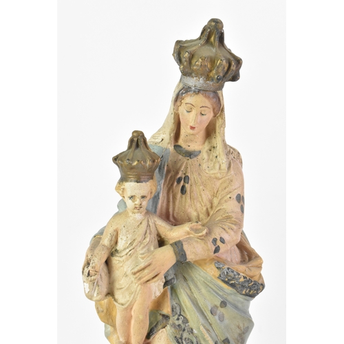 177 - An early/mid 20th century polychrome-painted plaster figure, depicting the Madonna and Child, both w... 