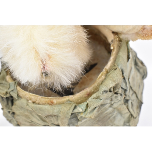 A late 19th Century French automaton toy of a rabbit in a cabbage, in ...