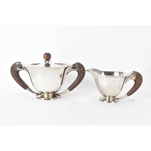 42 - An Art Deco four piece silver plated tea and coffee service, comprising a teapot, coffee pot, sugar ... 