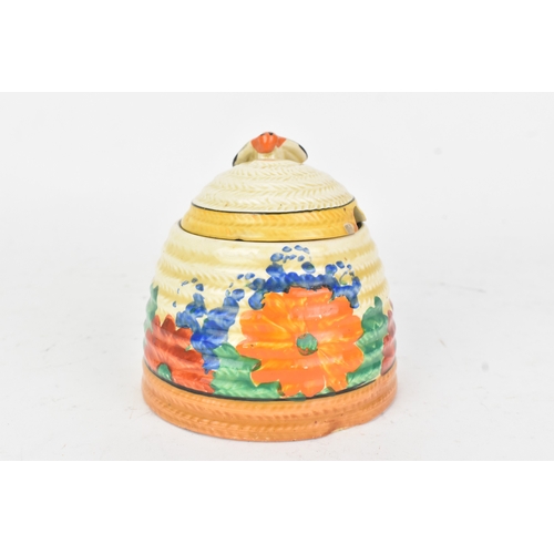 44 - An early twentieth century Newport Pottery Clarice Cliff 'Gay Day' pattern lidded honey pot, with ha... 