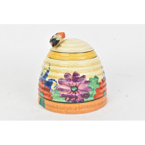 44 - An early twentieth century Newport Pottery Clarice Cliff 'Gay Day' pattern lidded honey pot, with ha... 