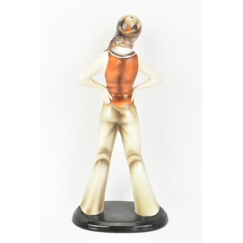 6 - Stefan Dakon (Austrian, 1904–1992) for Goldscheider - An Art Deco ceramic figure of a sailor girl, w... 