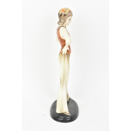 6 - Stefan Dakon (Austrian, 1904–1992) for Goldscheider - An Art Deco ceramic figure of a sailor girl, w... 