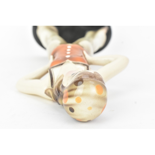 6 - Stefan Dakon (Austrian, 1904–1992) for Goldscheider - An Art Deco ceramic figure of a sailor girl, w... 