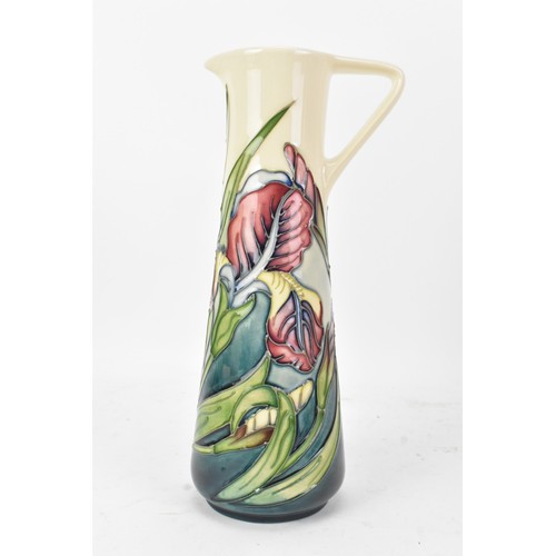 A Moorcroft pottery vase, in the 'Iris' pattern designed by Rachel ...