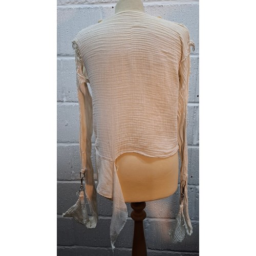 1 - A 1970's Seditionaries style muslin bondage top, cut in white muslin, depicting 2 cowboys to the fro... 