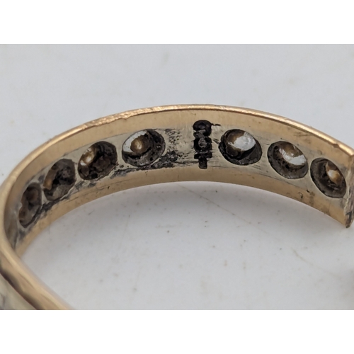 10 - A 9ct yellow and white gold full eternity ring A/F set with paste stones, weight 1.7g
Location: C1
I... 